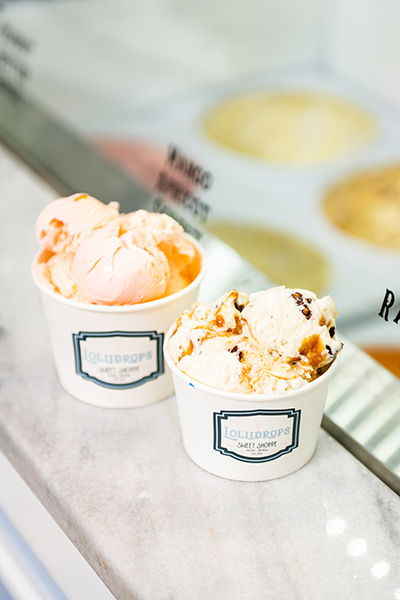 Two custom printed ice cream cups filled with ice cream